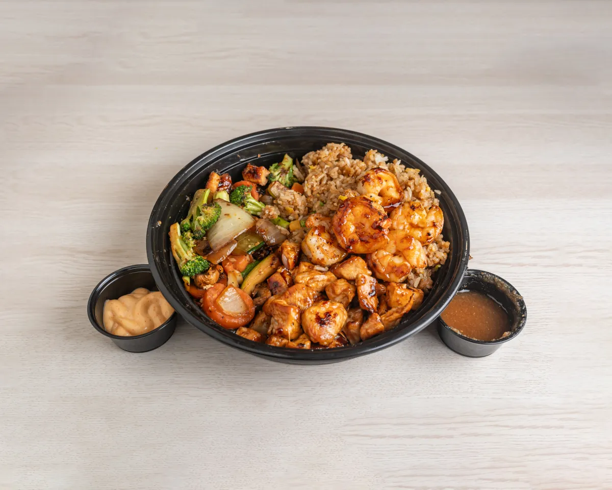 Combo Hibachi — chicken and steak with fried rice and vegetables