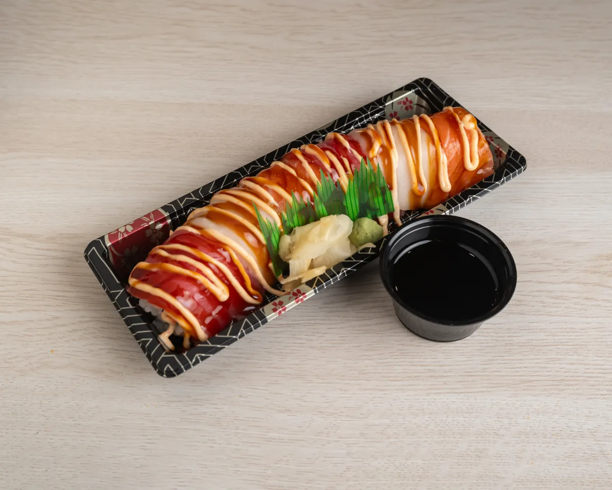 Rainbow Roll — California roll topped with assorted fish